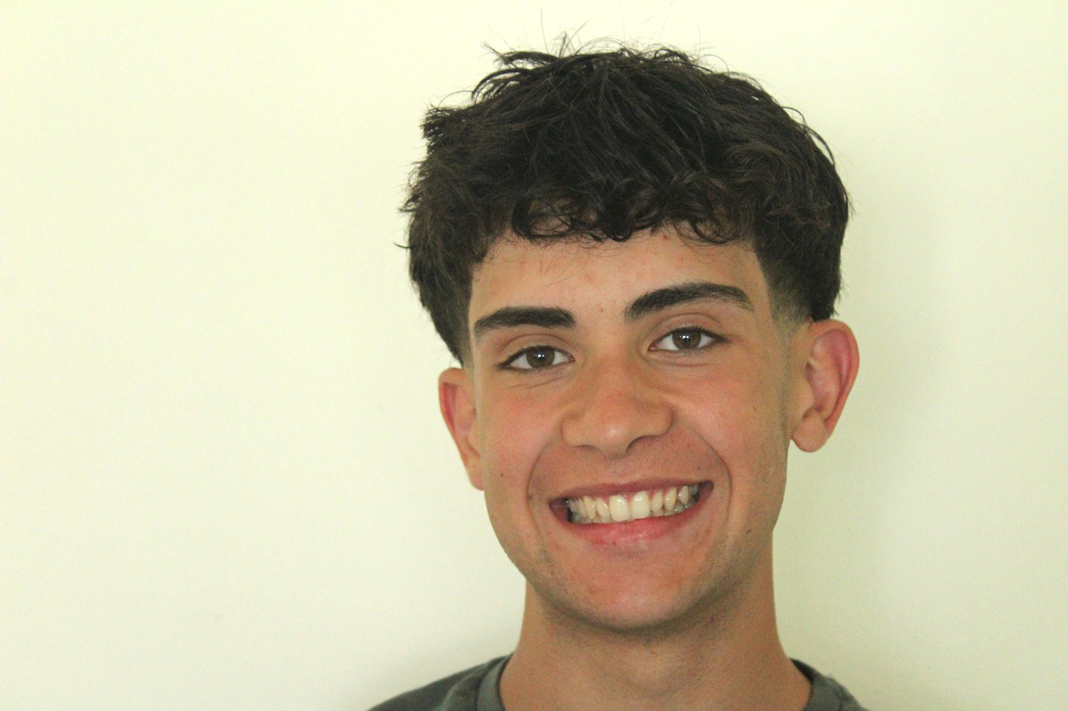 Portrait of a young Travel Different for Future volunteer sharing an Erasmus+ youth exchange experience in Lithuania and insights into responsible travel.